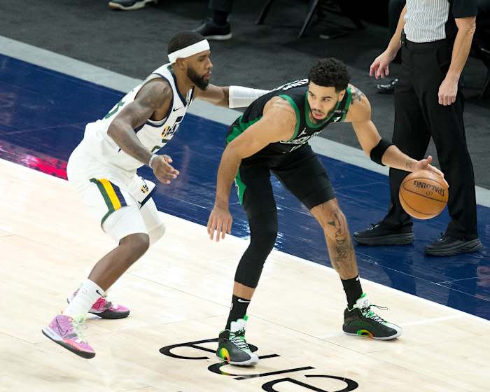 Royce O'Neale (23) guards Jayson Tatum (0)